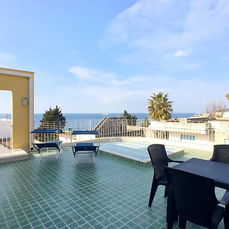 Attico 4 Colonne Vista Mare アパート
